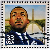 US Stamp with Martin Luther King Jr and the Washington Monument on it